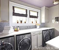 Laundry Room With Two Sets Of Washers And Dryers Transitional Laundry Room Laundry Room Design Laundry Room Decor Laundry Room Makeover