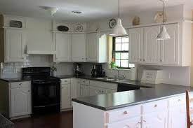 Finally A White Kitchen With Black Appliances This Is What Ours Will Have To Look Like Best Kitchen Cabinets Tile Countertops Kitchen White Cottage Kitchens