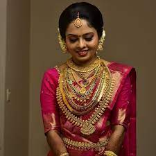 Image May Contain 1 Person Kerala Bride Indian Brides Jewelry South Indian Wedding Hairstyles