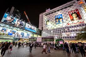 It's all neon lights, trendy japanese teens in wild outfits. Shibuya Station Wikiwand