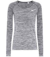 Pearlized buttons are selected to complement the shirt color. Nike Oberteil Dri Fit Knit Mytheresa Com Active Wear Tops Long Sleeve Tops Active Wear Nike