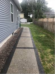 It's not as simple as pouring concrete or dropping cobblestones in a pattern you want. Custom Decorative Concrete Walkways B W Construction
