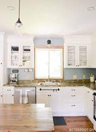 In a house in la's los feliz, designer tamar barnoon reconfigured an outdated kitchen, adding a wall above: How To Build Your Cabinets To The Ceiling