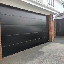 Say goodbye to the days of a boring garage door. Gds Uk Garage Doors Ltd On Twitter Job Completed These Doors Transformed This House In Blackburn With A Stylish Large Rib Designer Door In Jet Black With Smooth Finish Gdsuk Gdsukgaragedoors Gdsukgaragedoors Gdsukentrancedoors