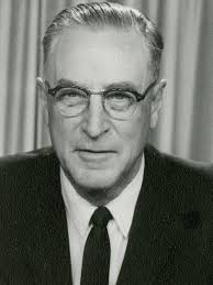 U.S. Senator Roger Marshall of Kansas, poses for a photo with Maj. Gen.  Monté L. Rone, commanding general of the 1st Infantry Division, and members  of his command team, at his home