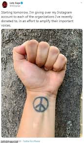 Lady gaga has a large tattoo of roses that spans from her lower back to the left side of waist. Lady Gaga Vows To Use Social Media For Causes Like Black Lives Matter To Lift Up Black Community Readsector