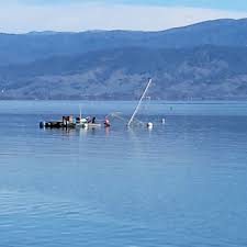 Man raises sunken boat from Clear Lake