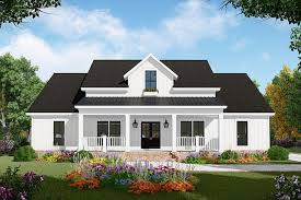 Usually features a wide porch at the front of the house. The Modern Farmhouse A Design Trend That Is Here To Stay Blog Homeplans Com
