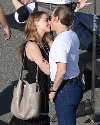 Johnny Depp in gross jeans hugs Amber Heard