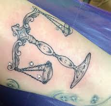 Woman cute libra tattoos