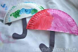 Exploring art and crafts is fun for 2 year olds and can help development progress as well. Preschool Paper Plate Umbrella Craft Creative Family Fun