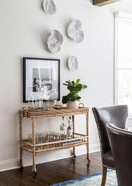 The chic piece features two open mirrored shelves for keeping drinks handy. Serena And Lily South Seas Bar Cart With Gold Tray Transitional Dining Room