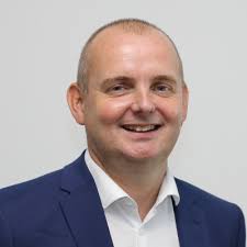 These photos show the start and the end of my 20 year career with Flight  Centre