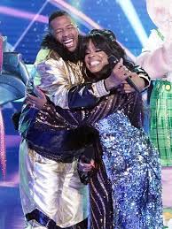Nick cannon is about to welcome a pair of twins with abby de la rosa, as she shared footage and photos of the couple together that showed off her pregnant belly. Masked Singer Nick Cannon Unveiled As Bulldog Returns As Host