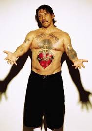 This impressive artwork covers a majority of his torso. Daily Vibes Danny Trejo Tattoos