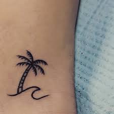 This palm tattoo shows the two alongside each other as if to say that both tall and tiny are cute. Minimalist Small Palm Tree Tattoo Novocom Top
