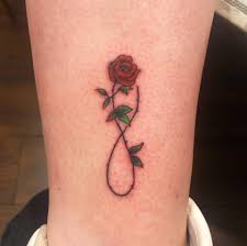 Maybe you would like to learn more about one of these? 2 Little Infinity Roses Done George Gamble Tattoo Artist Facebook