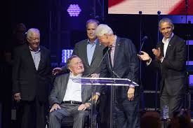 Former president jimmy carter stands behind him. George H W Bush S Letter To Bill Clinton On Inauguration Day 1993 Vox