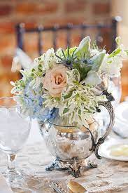 Maybe you would like to learn more about one of these? Vintage Silver Teapot Filled With Flowers Great Idea For A Centerpiece At A Tea Party Flower Arrangements Silver Decor Wedding Flowers