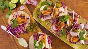 Preheat oven to 375 and place your fish in a glass baking dish. Chipotle Grilled Fish Tacos With Tequila Lime Slaw And Avocado Crema Rachael Ray Show