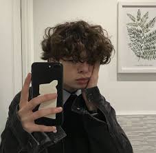The eboy haircut, also referred to as a curtain hairstyle, involves hair that is longer in length, usually falling around the the eboy cut can be worn on men with all hair textures, from straight to curly. Curly Hair Men Eboy Novocom Top