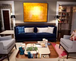 A lower display shelf is a great place to keep extra coffee table books or magazines. Interior Affair Sex And The City 2 Decor Steals The Scenes Beautygeeks