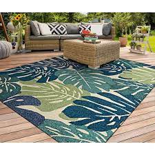 These outdoor rugs are available in a beautifulthese outdoor rugs are available in a beautiful array of patterns and colors try placing a natural rug on your patio or deck for a neutral option that brings the outdoors right to your doorstep. Covington Monstera Cream Multi Indoor Outdoor Area Rug Multiple Sizes Walmart Com Walmart Com