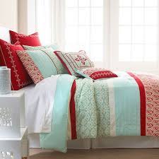 Blue bedding with red and fuchsia flowers and red ruffles on the pillowcases. Pin On Natalie S Bedroom