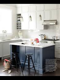 A splash of lime green energizes this white kitchen. This Is The Kitchen Inspiration Blue Kitchen Island Subway Tile Lighting Grey And Whites Apartment Kitchen Island Kitchen Inspirations Kitchen Renovation