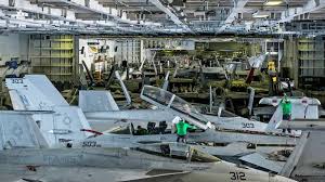 Check Out The Crowded Hangar Bay Aboard The Carrier Uss Dwight D Eisenhower Aircraft Carrier Navy Carriers Navy Aircraft Carrier