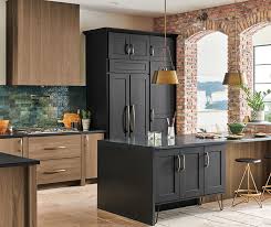 It will allow you to use something like stainless steel and glass to make the kitchen look bright and modern. Transitional Walnut And Maple Kitchen Cabinets Decora Cabinetry