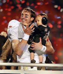 Drew Brees And Son With A Guaranteed New Contract New Orleans Saints New Orleans Saints Football Superbowl Xlv
