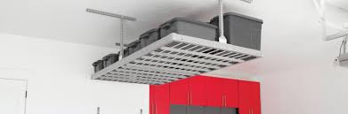 If your garage isn't painted, you can easily identify stud locations by the vertical rows of nails or screws. Overhead Garage Ceiling Storage Gorgeous Garage