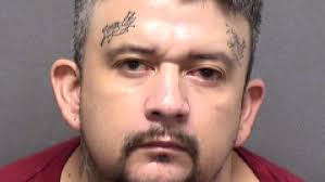 Discarded bandana leads police to man accused of robbing smoke shop,  kidnapping woman