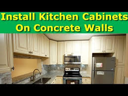 How To Install Kitchen Cabinets On Concrete Brick Walls Drywall Youtube