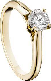 Superbe bague solitaire de la collection 1895 en or jaune, élégamment sertie d'un diamant de taille brillant au total 090 carat, épaulée d'une délicate monture en chute bombée. Crn4235100 Solitaire 1895 Yellow Gold Diamond Cartier