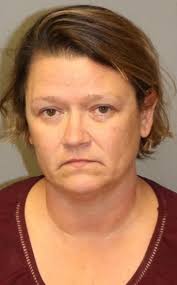 Woman charged with trying to run ex-boyfriend off the road, shooting at him