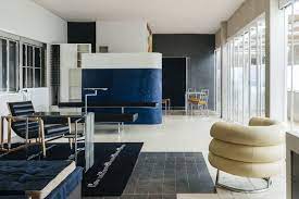 Pictured with her e1027 table and day bed. Pin On Intriguing Things