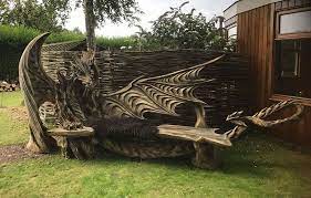 German Wood Carver Used A Chainsaw To Create This Bench Igor Lostukow Mythical Dragons Chainsaw Sculpture Wooden Sculpture
