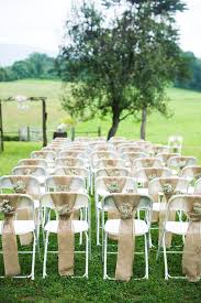 Inexpensive Folding Chairs 16 Fabulous Ways To Decorate Ctc Event Furniture Wedding Ceremony Chairs Rustic Burlap Wedding Wedding Chair Decorations