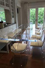 This dining table stands 30″ tall and seats 6 people comfortably. Here S How To Style Acrylic Dining Chairs Acrylic Dining Chairs Transitional Dining Room Dining Room Furniture Sets