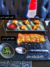 عاشق مطاعم Twitterissa وولف كافيه من ابداعات الشيف احمد مساوى في جدة اطباقهم خلاصة تجارب حول العالم يعني من بلدان مختلفه جايبين اطباق نادره ومميزه وبأسعار رخيصه مثلا شاه بيلاف من اذربيجان كراب رانجون من مطعم صيني بأمريكا ارز كون بولو من مطعم في البحرين