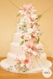 We use blue pink, peach and salmon colors for the flowers and. Sugar Flowers Cascade Wedding Cake Casa Costello