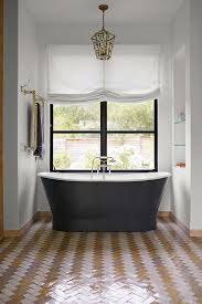A focused shot of a single warm brick terracotta tile on a white background. Advice For Bathroom Tiles House Garden