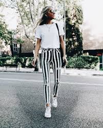 pin by sarah silvester on my style fashion black and white striped pants frayed bottom jeans