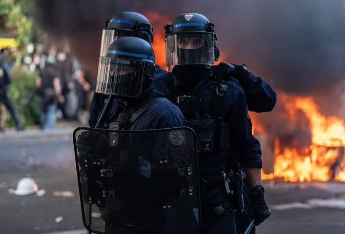 French riots: Police forced to stop using stun grenades as Emmanuel Macron  admits response 'too harsh'