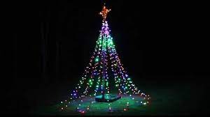 50 best ideas for coastal christmas! Twinkling Tree Of Lights Diy From Basketball Hoop Hanging Christmas Lights Diy Christmas Lights Outdoor Christmas Lights
