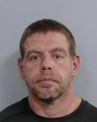 A Richmond man is facing charges after his brother told police he broke  into his apartment in Lexington and tried to stab him in the testicles with  a pair of scissors. Justin