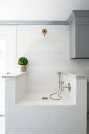 The interiors of your bathroom can now look warm with these cool brick wall designs. White Brick Shower Tiles Design Ideas