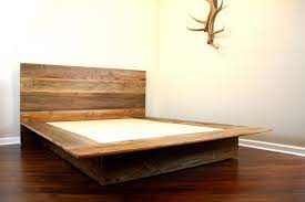 If you're short on money, getting your hands on some reclaimed wood or wood furniture that is being discarded is a great way to get this diy project started. Reclaimed Wood Platform Bed Salvaged Wood Headboard Vintage Fir Plank Bed 2 300 00 Via Etsy Rustic Platform Bed Diy Platform Bed Modern Bed Frame
